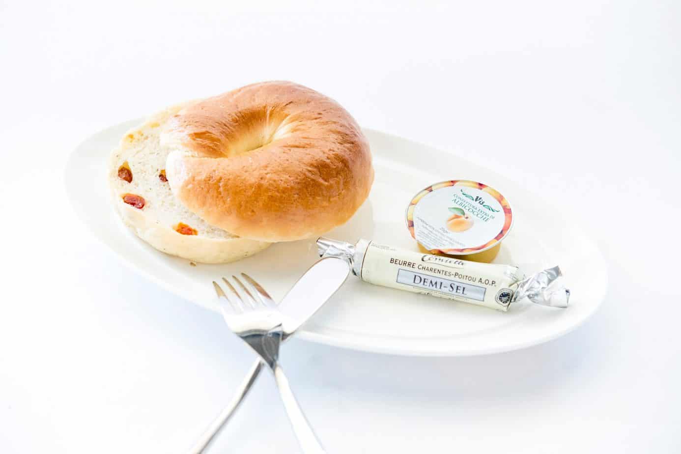 plate of bagels cut in half 