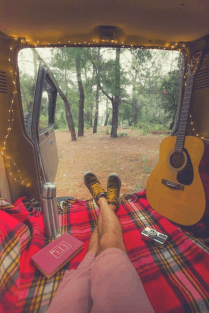 car camper relaxing in his van