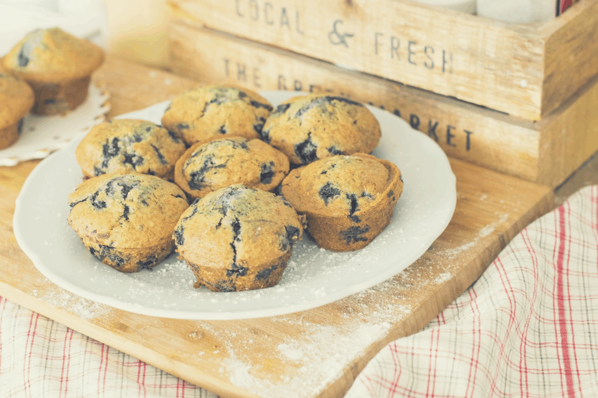 muffins and fruit on a plate