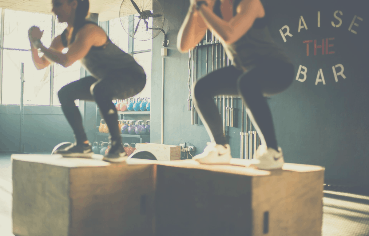 2 women working out at home