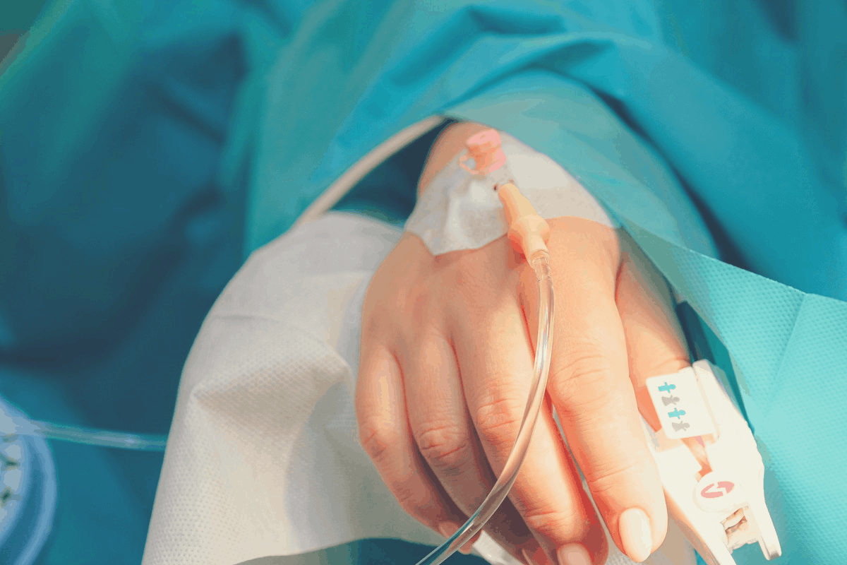 patient lying in a hospital bed