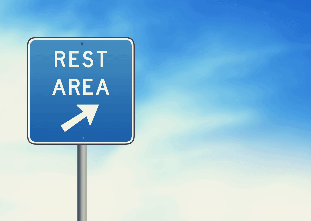 sign post to a rest stop