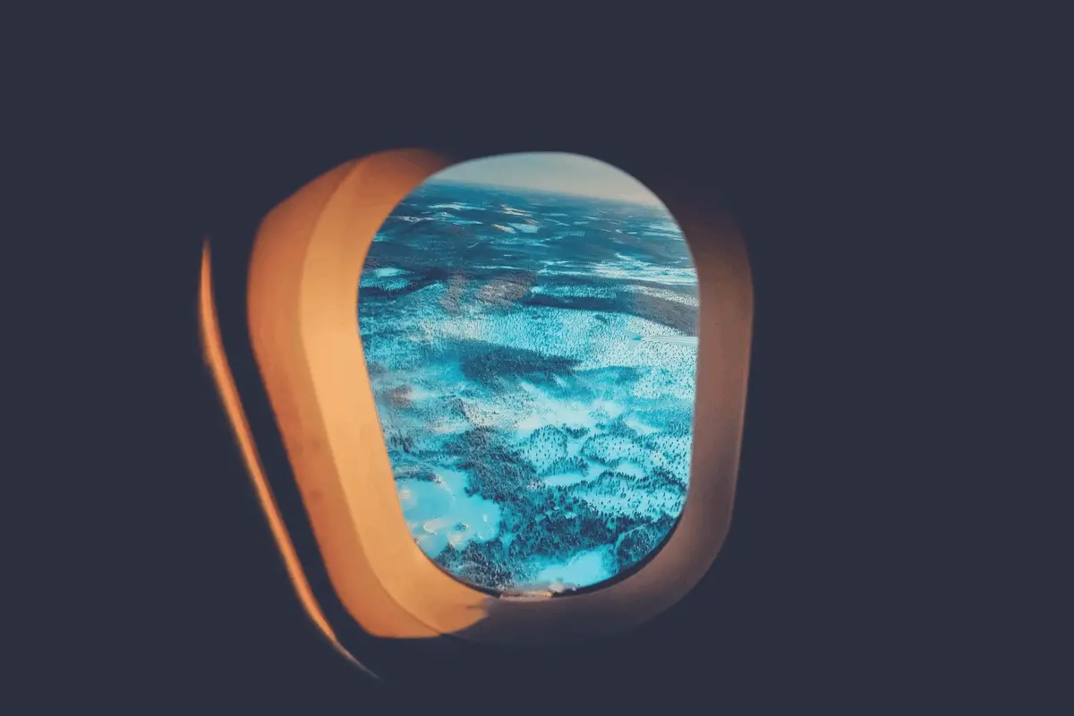 cloudy sky in an aircraft window