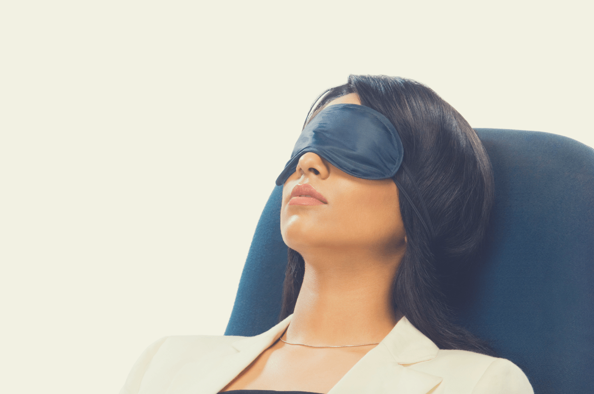 woman wearing a sleep mask