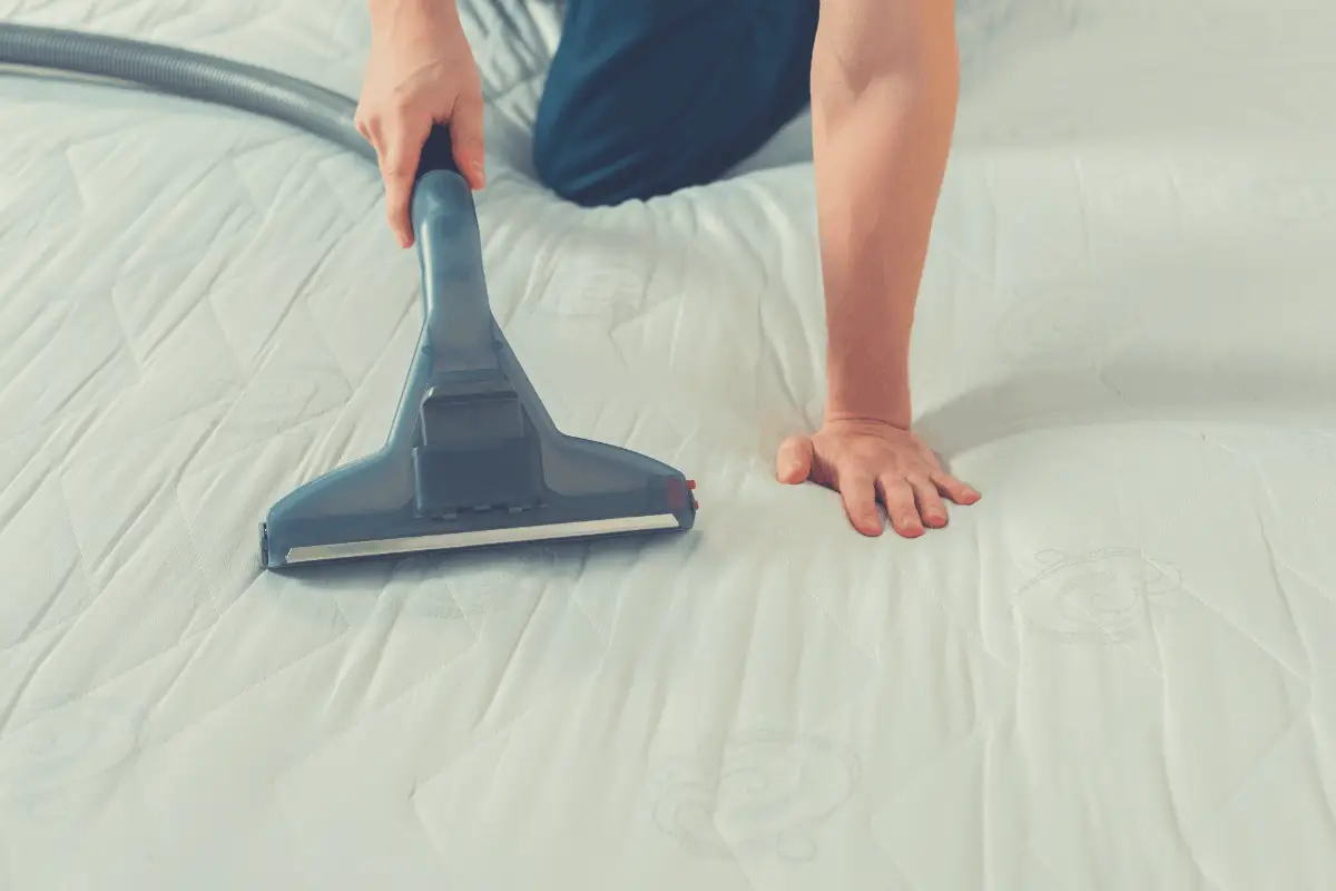 memory foam mattress being vacuum cleaned