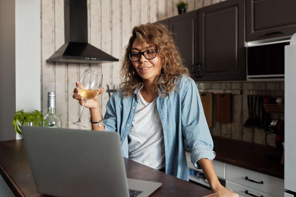 lady holding a glass of wine