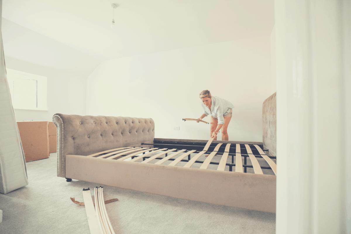 blonde installing a slatted bed