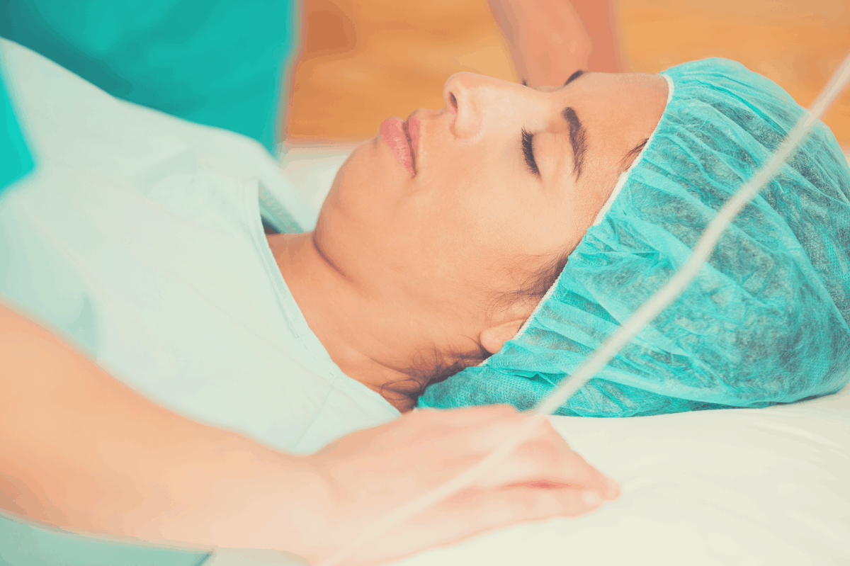 woman sleeping post surgery