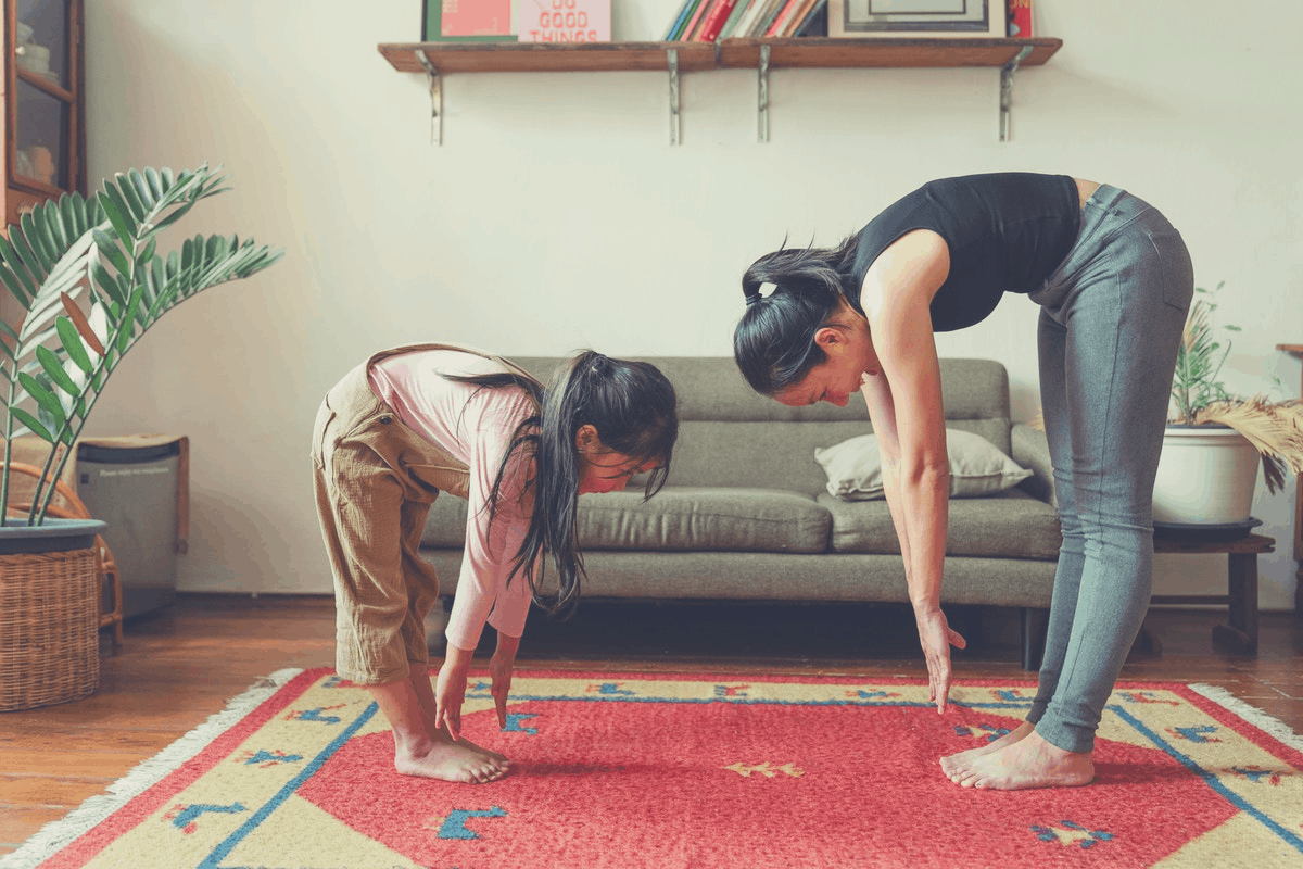 mother and child performing stretches