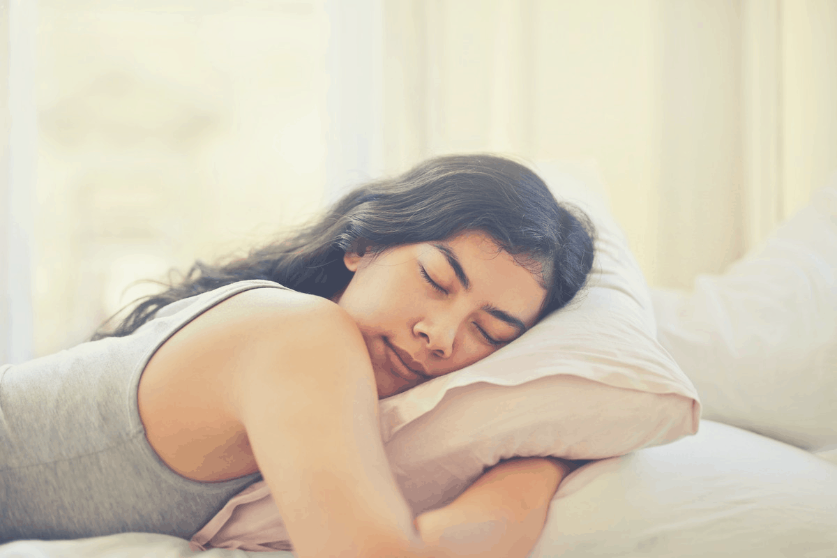 brunette sleeping on her tummy